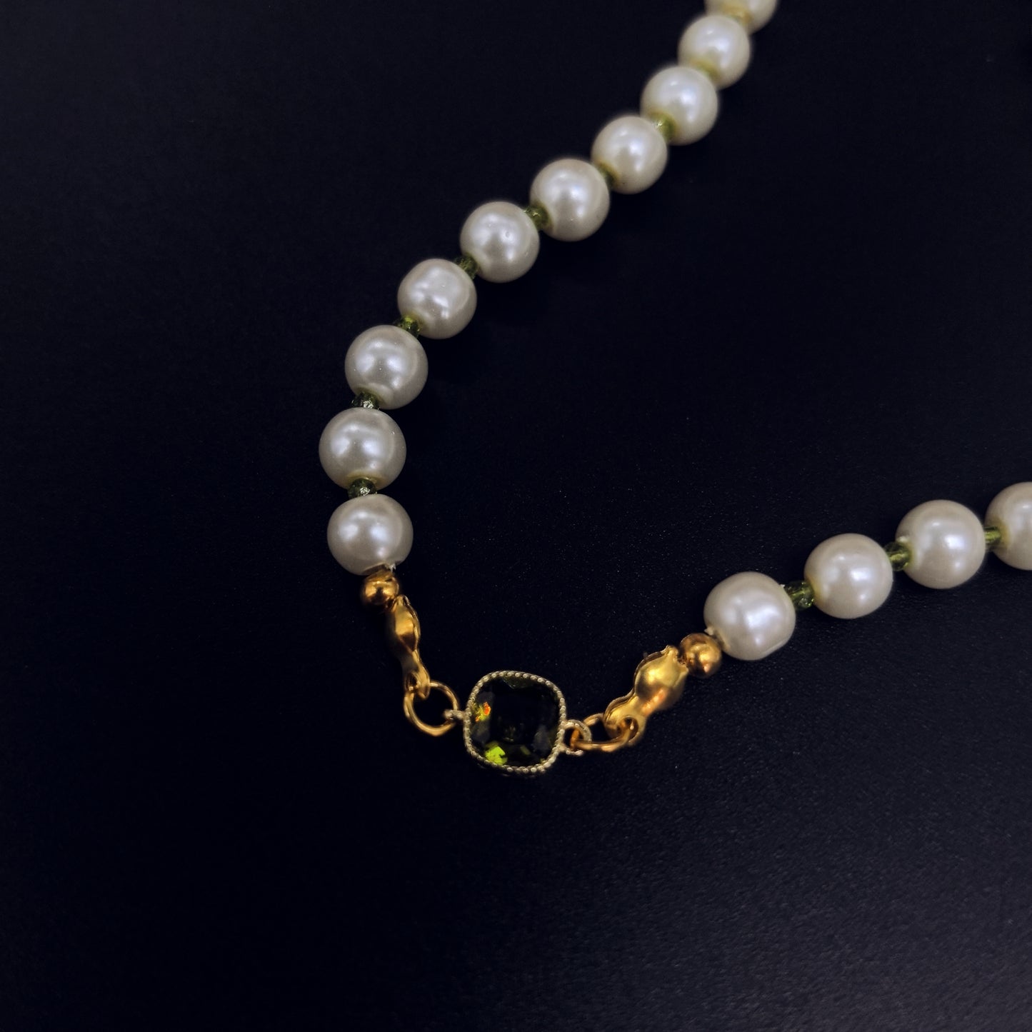 Elegant Pearl Necklace with Green Crystal Accent